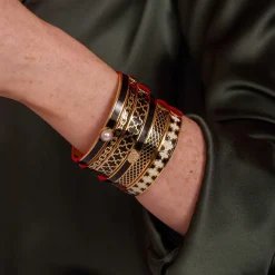 Agama Black, Cream Gold Hinged Enamel Bangle | Halcyon Days