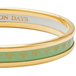 Christmas Robin Enamel Bangle In Navy & Gold | Halcyon Days