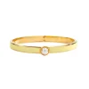 Skinny Cabochon Pearl Buttercup Gold Bangle | Halcyon Days